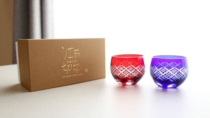 A pair of sake cups with gentle roundness and deep cuts