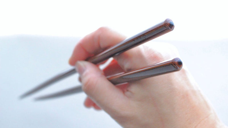 Lacquered chopsticks for ease of use