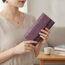 [WALLET] BUNDLE WALLET S 2310 FLOWER ARABESQUE (PURPLE BASECOAT WITH BLACK LACQUER) | KOUSHU INDEN (LACQUERED DEERSKIN CRAFTS)| INDEN-YA｜使用イメージ（演出・着用）※手作りのため色・風合いは一点ごとに異なります