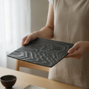 [PLATE] AKITA CEDAR PLATE – BLACK URUSHI LACQUER FINISH | WOODWORK | KOBO MOKU｜使用イメージ（演出・手持ち）※手作りのため色・風合いは一点ごとに異なります