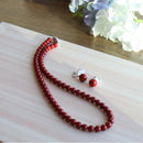 Clip-on earrings for both ears.