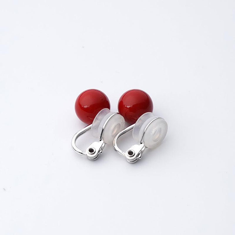 Clip-on earrings for both ears.